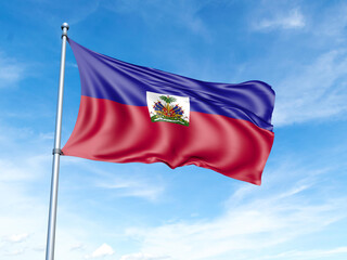 Naklejka na ściany i meble Haiti flag on a pole against a blue sky background.