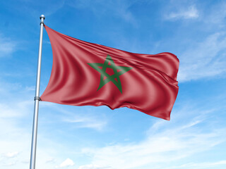 Morocco flag on a pole against a blue sky background.