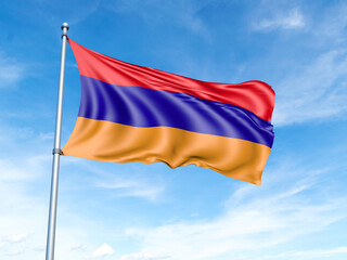 Armenia flag on a pole against a blue sky background.