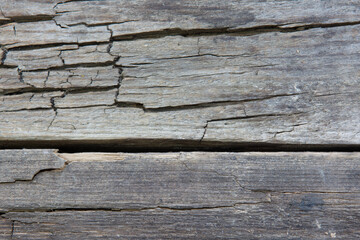 The texture of the old gray cracked Board
