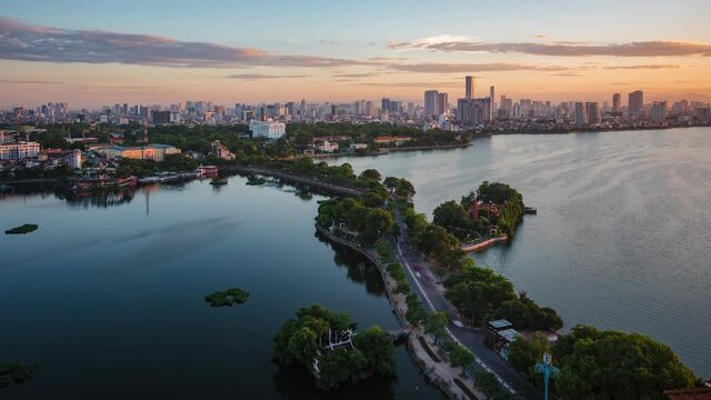 Hanoi, Vietnam, time lapse view of Hanoi skyline showing West Lake and Tay Ho District at sunset.