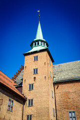 Obraz premium It's Akershus Fortress, a medieval castle that was built to protect Oslo, the capital of Norway. It has also been used as a prison.