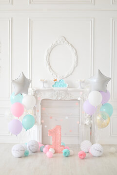 Birthday party decoration with balloons and cakes