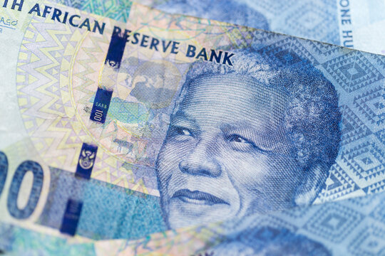 Obverse of South African ZAR banknote with a denomination of 100 rand, and an image of Nelson Mandela.