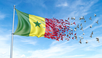 Senegal flag on a pole turn to birds while waving against a blue sky background - 3D illustration.