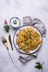 Stewed healthy bulgur with vegetables