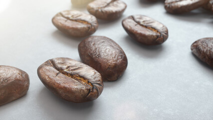 Isolated 3d coffee beans are lying on white background.  3d rendering