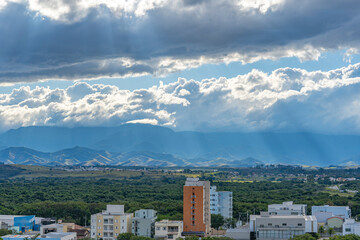 Mountain and clouds and city landscape. Brazil, South America. 