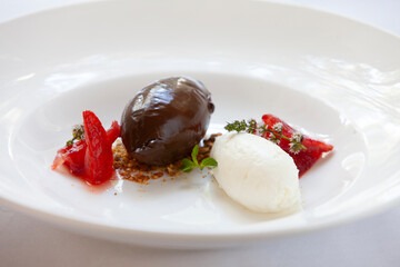 Gourmet dessert of chocolate and cream with strawberries
