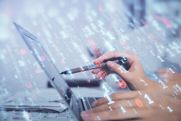Multi exposure of woman hands working on computer and data theme hologram drawing. Tech concept.
