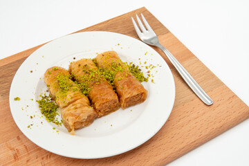 Turkish burma baklava on wooden floor