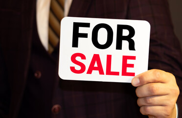 word sale with crumpled paper background as concept design