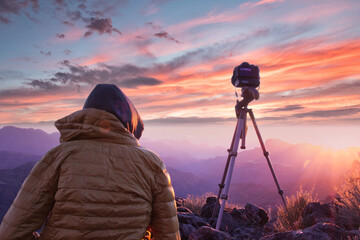 photographer at sunset