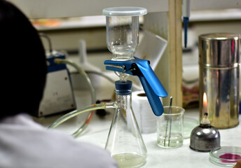 Closeup of Chemical tube for research, scientific experiments for the future at lab background, selective focus.
