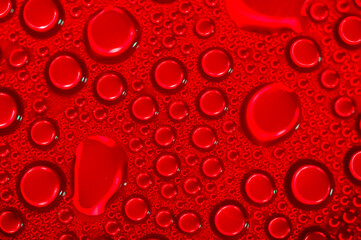 Water droplets in red light