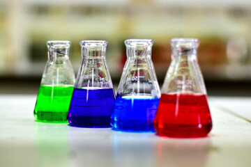 Closeup of Chemical tube for research, scientific experiments for the future at lab background, selective focus.