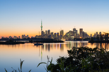 Toronto dusk night skyline view from Tommy Thompson park