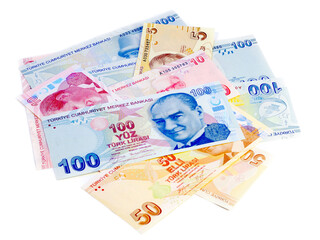 Turkish Lira TL money.  Pile of bills isolated on white
