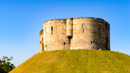 Fototapeta na wymiar Clifford's Tower in York, a historic walled city, North Yorkshire, England.