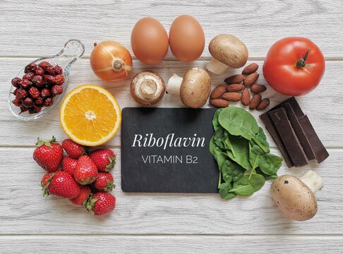 Foods rich in vitamin B2 (riboflavin). Natural sources of vitamin B2: mushroom, spinach, onion, almond, dark chocolate, rose hips, strawberry, orange, egg, tomato.