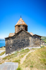 Fototapeta premium It's Sevanavank (Sevan Monastery), a monastic complex located on a shore of Lake Sevan in the Gegharkunik Province of Armenia