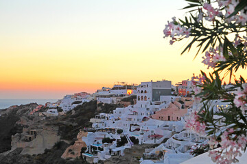 Sunset view of the town of Fira in Santorini, Greece.