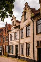 Fototapeta na wymiar It's Medieval houses in Historic Centre of Bruges, Belgium. part of the UNESCO World Heritage site