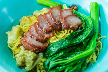 Wanton Mee, meal in the Chinatown hawker center in Singapore.