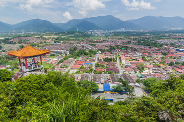 Fototapeta na wymiar IPOH, MALAYASIA - MARCH 25, 2018: View from the hill abouve Perak Tong cave temple in Ipoh, Malaysia.
