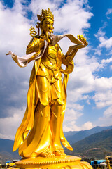 Fototapeta premium Golden statue around the Big Buddha statue in the Kingdom of Bhutan