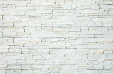White stone slate wall as a background or texture.
