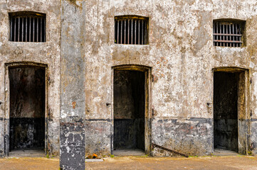 Fototapeta na wymiar Abandonned cells in the Prison in Saint Laurent du Maroni, French Guiana, South America