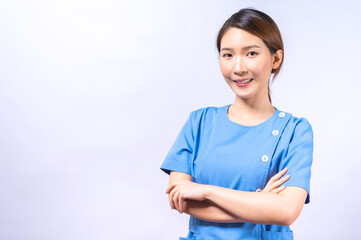 Portrait of smiling Asian nurse isolated on white background