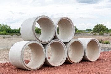 Concrete Drainage Pipe on a Construction Site.  Concrete drainage pipes stacked for construction....