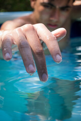 hand in the pool