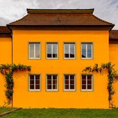 Fototapeta na wymiar Yellow building of Meersburg, a town of Baden-Wurttemberg in Germany at Lake Constance.