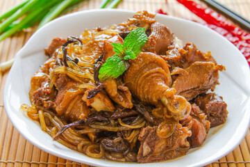 Stew chicken with shiitake mushroom, chinese food close up 