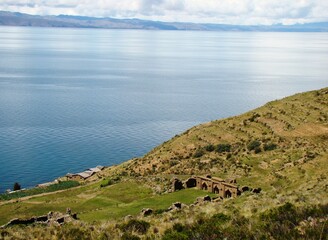 Fototapeta na wymiar Remainings of the Acllawasi (Temple of the virgings of the sun god) at Isla de la Luna (Moon Island) at Lake Titicaca, Bolivia