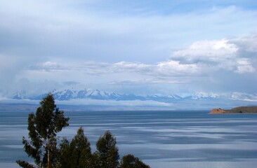 View from Isla del Sol to Isla de la Luna (Lake Titicaca, Bolivia) with Cordillera Real in the Background