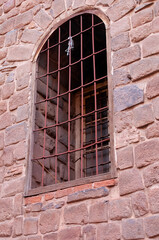 Fototapeta na wymiar Lattice window on church wall
