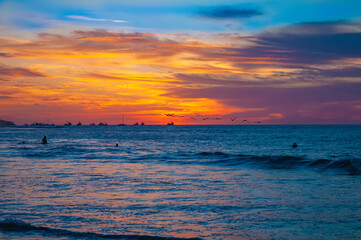Obraz premium Sunset and a half of a quiet beach.