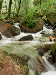 River Leça Waterfalls in Monte Cordova, Portugal. The river water runs down the big rocks of the...