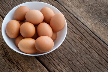 Chicken Eggs on wooden background. easter