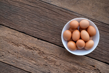 Chicken Eggs on wooden background. easter