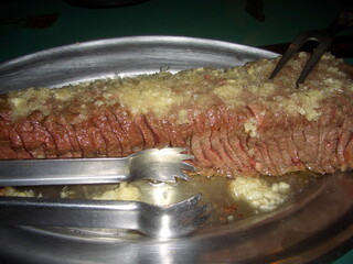Traditional sliced picanha served on the stove at Sao Paulo, Brazil