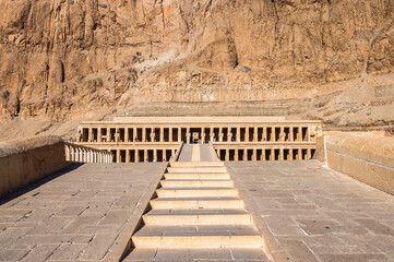 It's Queen Hatshepsut's temple (Dayr el-Bahari or Dayr el-Bahri), part of the Theban Necropolis.