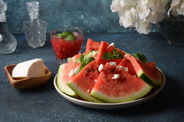 Fresh summer watermelon with feta cheese and mint
Vegan food. Diet, Vegetarian.
