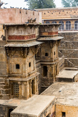 Fototapeta premium It's Part of the Chand Baori, a stepwell in the village of Abhaneri near Jaipur, state of Rajasthan. Chand Baori was built by King Chanda of the Nikumbha Dynasty