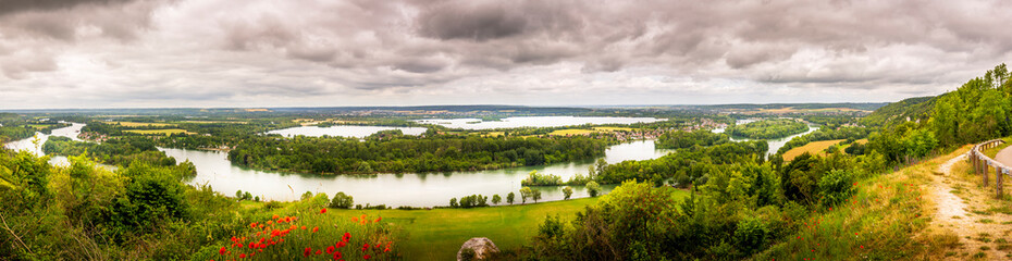 Fototapeta na wymiar Large view by wide angle on the Seine River close to Rouen in France.