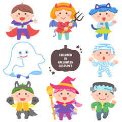 Children posing in Halloween ghost costumes